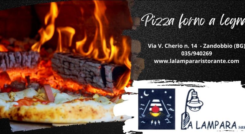 pizzeria con pizza cotta al forno a legna